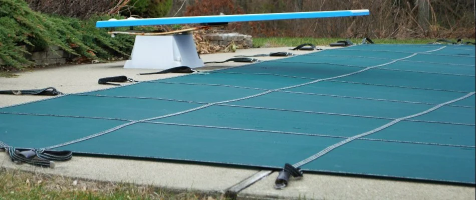 Covered pool in Bridgehampton, NY, during winter.