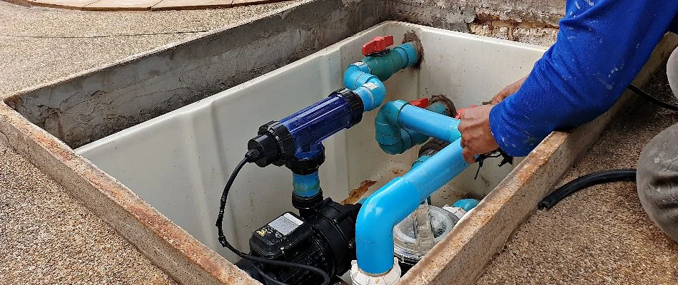 Crew checking on a pool pump in Bridgehampton, NY.
