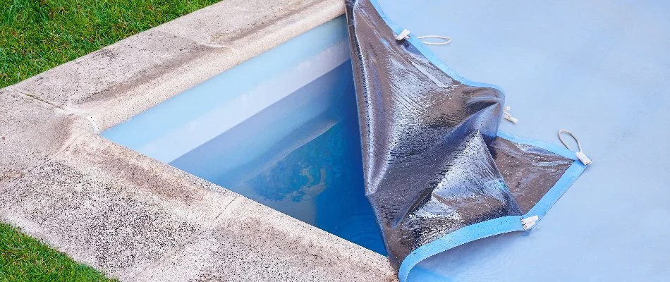 Partially opened pool cover in Bridgehampton, NY.