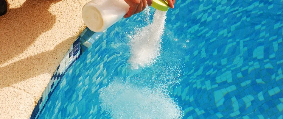 Pool in Bridgehampton, NY, being treated with chemicals.