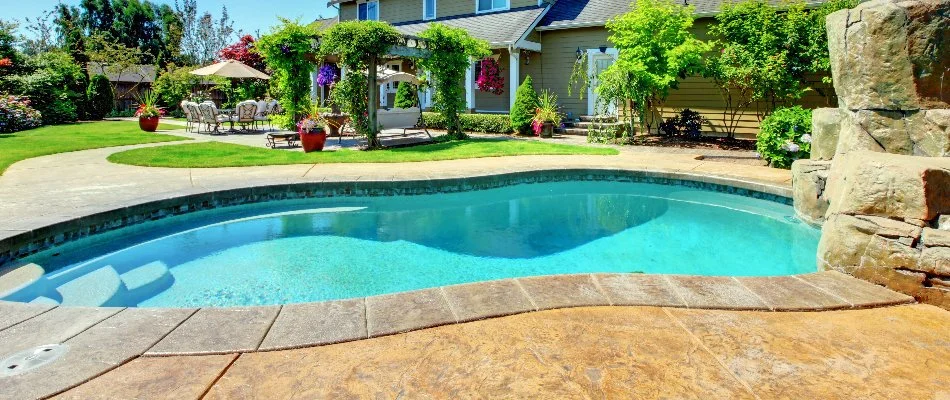 Pool in the backyard of a house in Bridgehampton, NY.