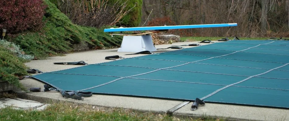Pool in Bridgehampton, NY, with a cover.