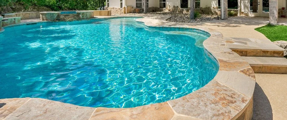 Pool in Bridgehampton, NY, with crystal clear waters.