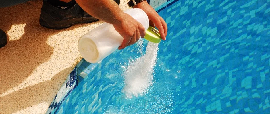Chemicals being added to a pool in Bridgehampton, NY.